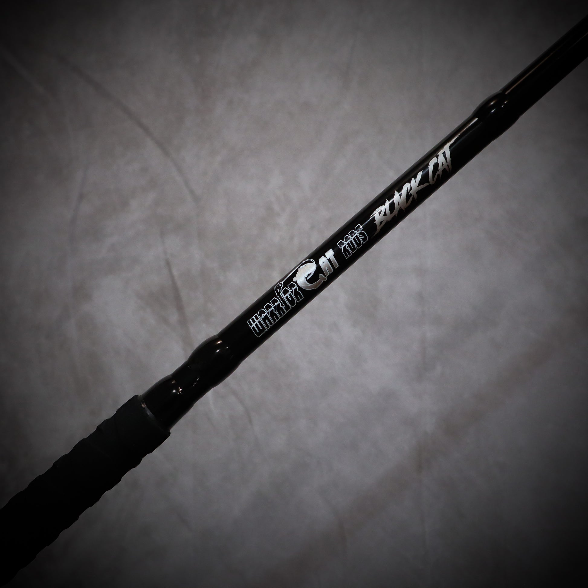 black medium size fishing pole 7'6" Black Cat MH Spinning Rod